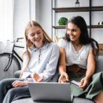 two young women Building a Pre-Investment Financial Foundation