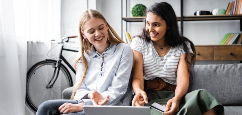 two young women Building a Pre-Investment Financial Foundation